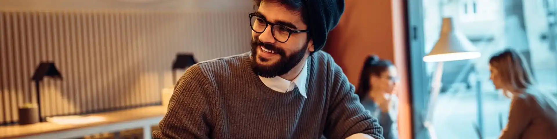 college student smiling to his friend